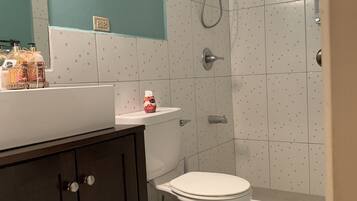 Shower, towels, soap, toilet paper