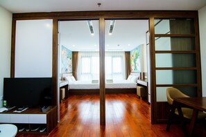 Apartment, 2 Bedrooms | Living room | 42-inch Smart TV with cable channels, TV - HANA Stay (Hanoi)