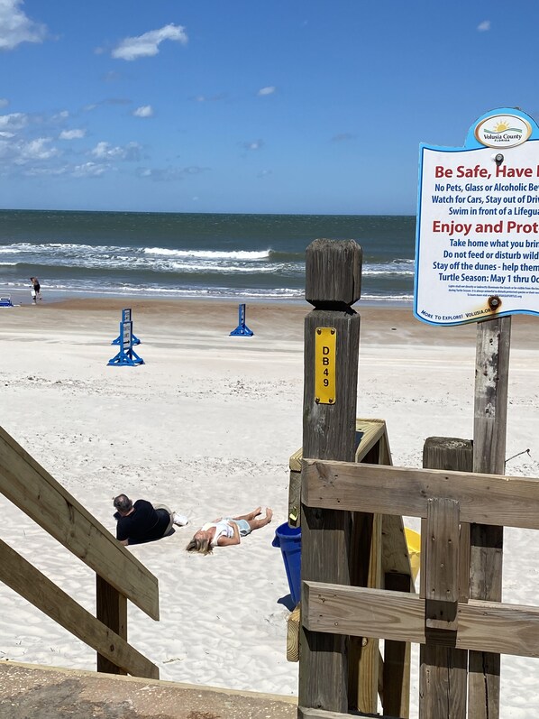 On the beach, sun-loungers, beach towels