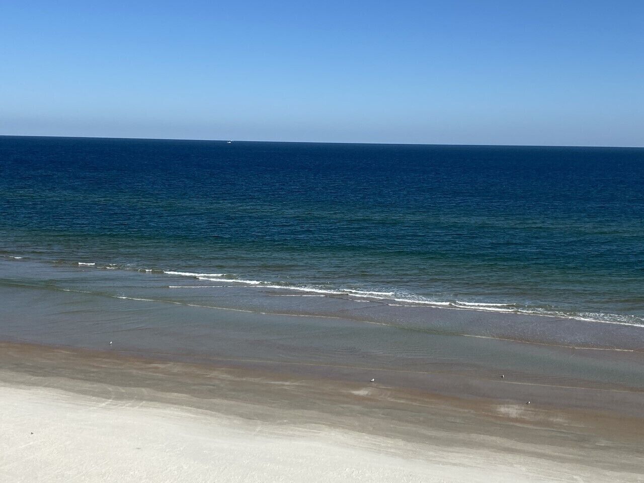 On the beach, sun loungers, beach towels