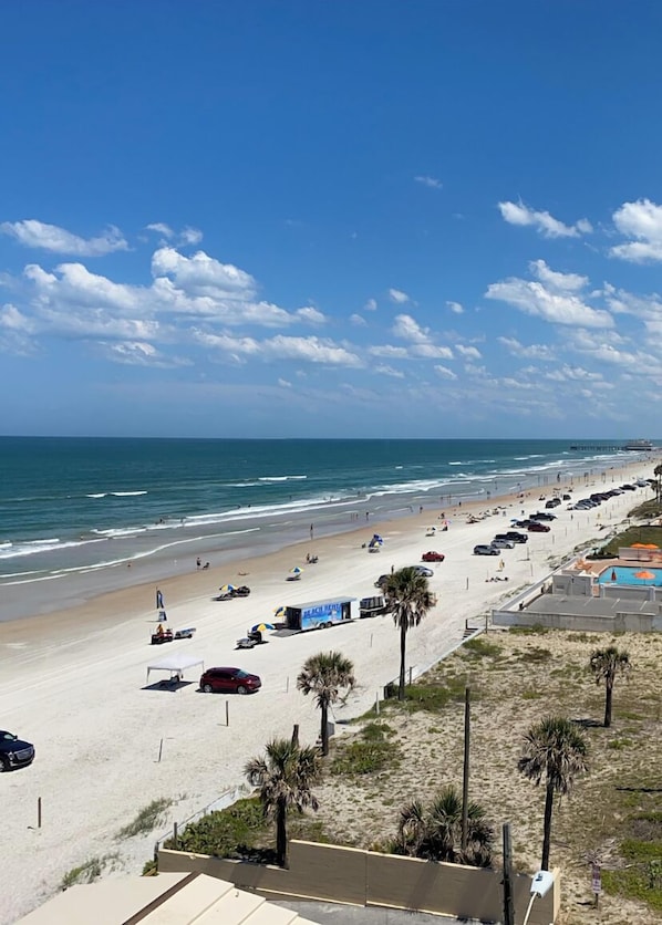 On the beach, sun loungers, beach towels