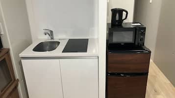 Double Bed Room | Private kitchen | Full-sized fridge, microwave, stovetop, electric kettle