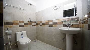 Shower, free toiletries, slippers, towels
