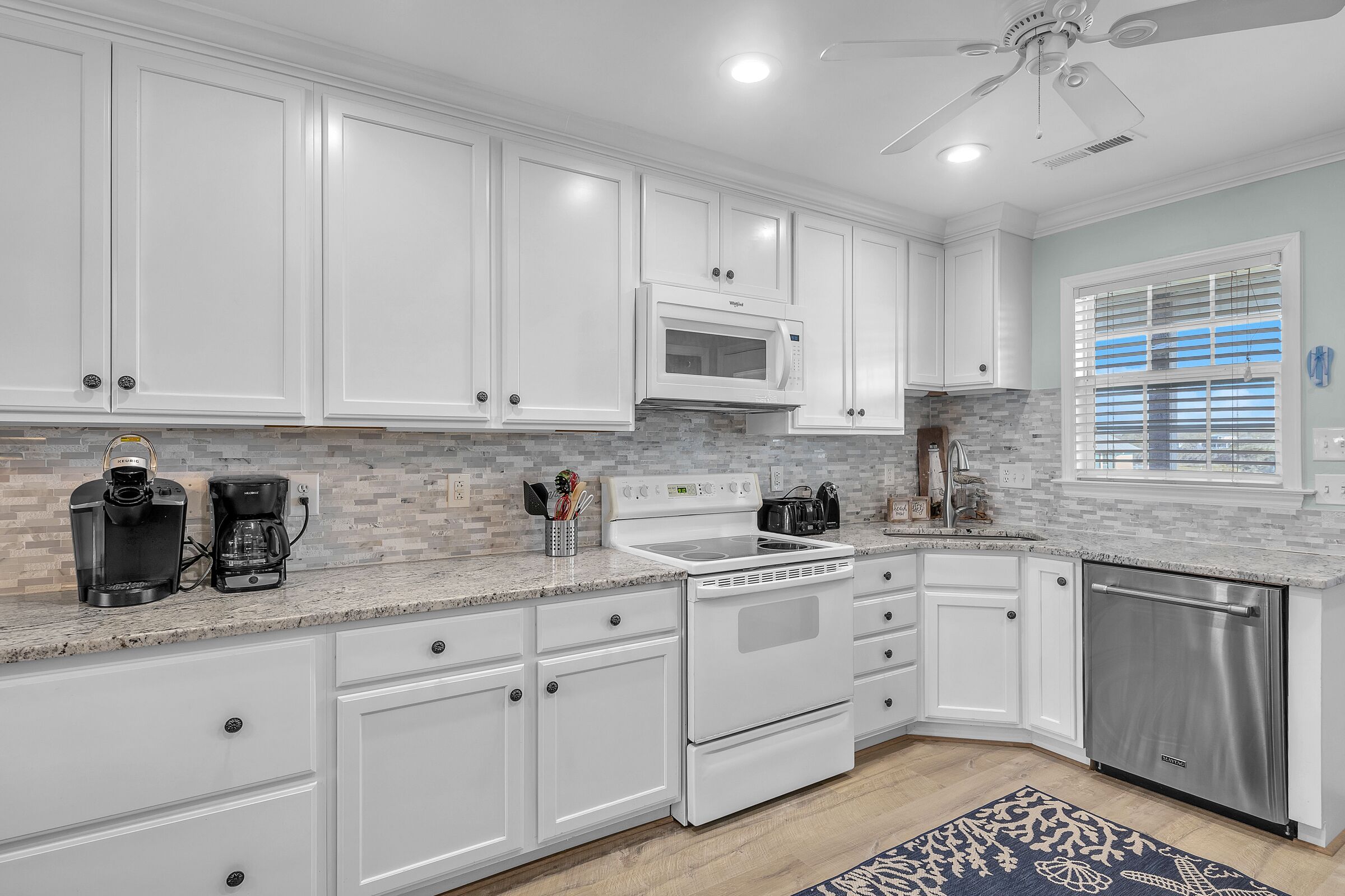 Dishwasher, coffee/tea maker, highchair, cookware/dishes/utensils