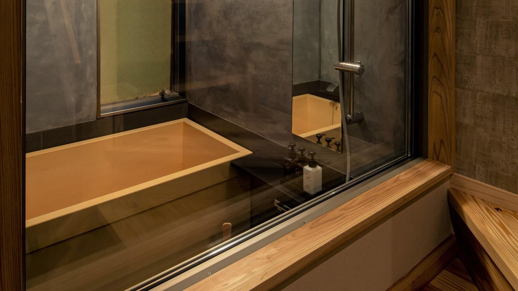Bathroom | Separate tub and shower, free toiletries, hair dryer, slippers