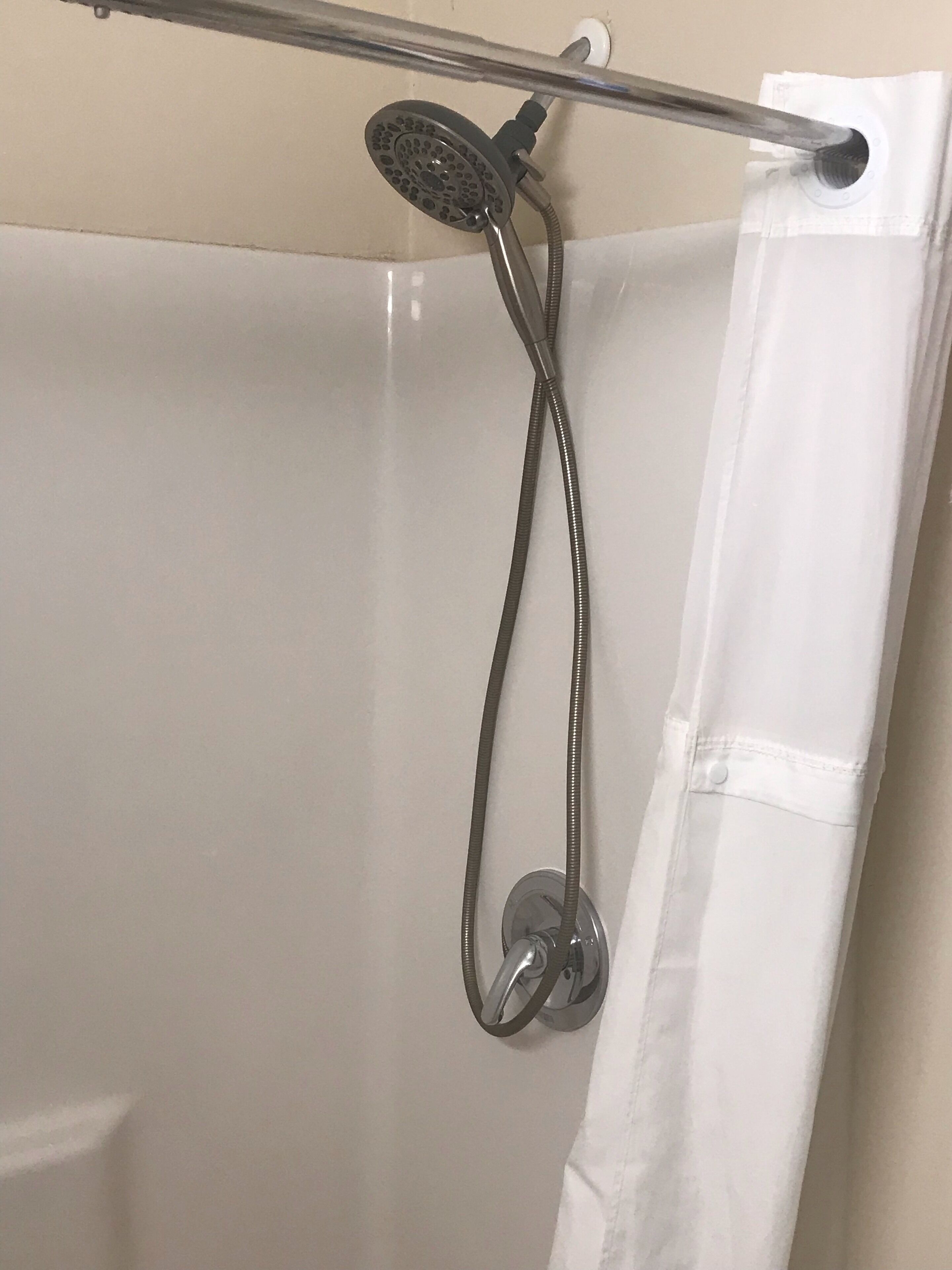 Combined shower/bathtub, hair dryer, towels, soap