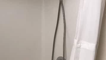 Combined shower/bathtub, hair dryer, towels, soap