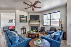 Smart TV, fireplace, DVD player, books