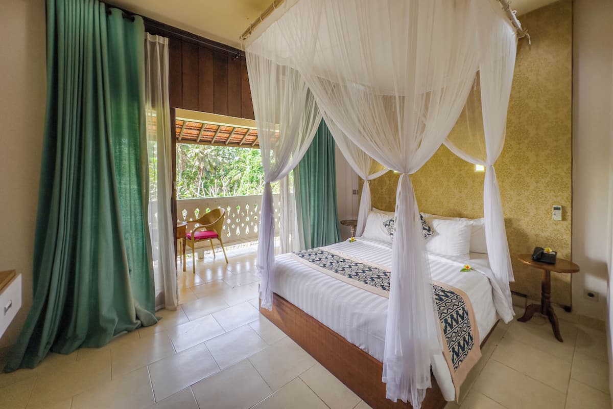 Deluxe Room, Garden View | 1 bedroom, individually decorated, individually furnished, desk