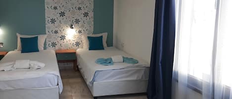 3 slaapkamers, een strijkplank/strijkijzer, gratis wifi, beddengoed