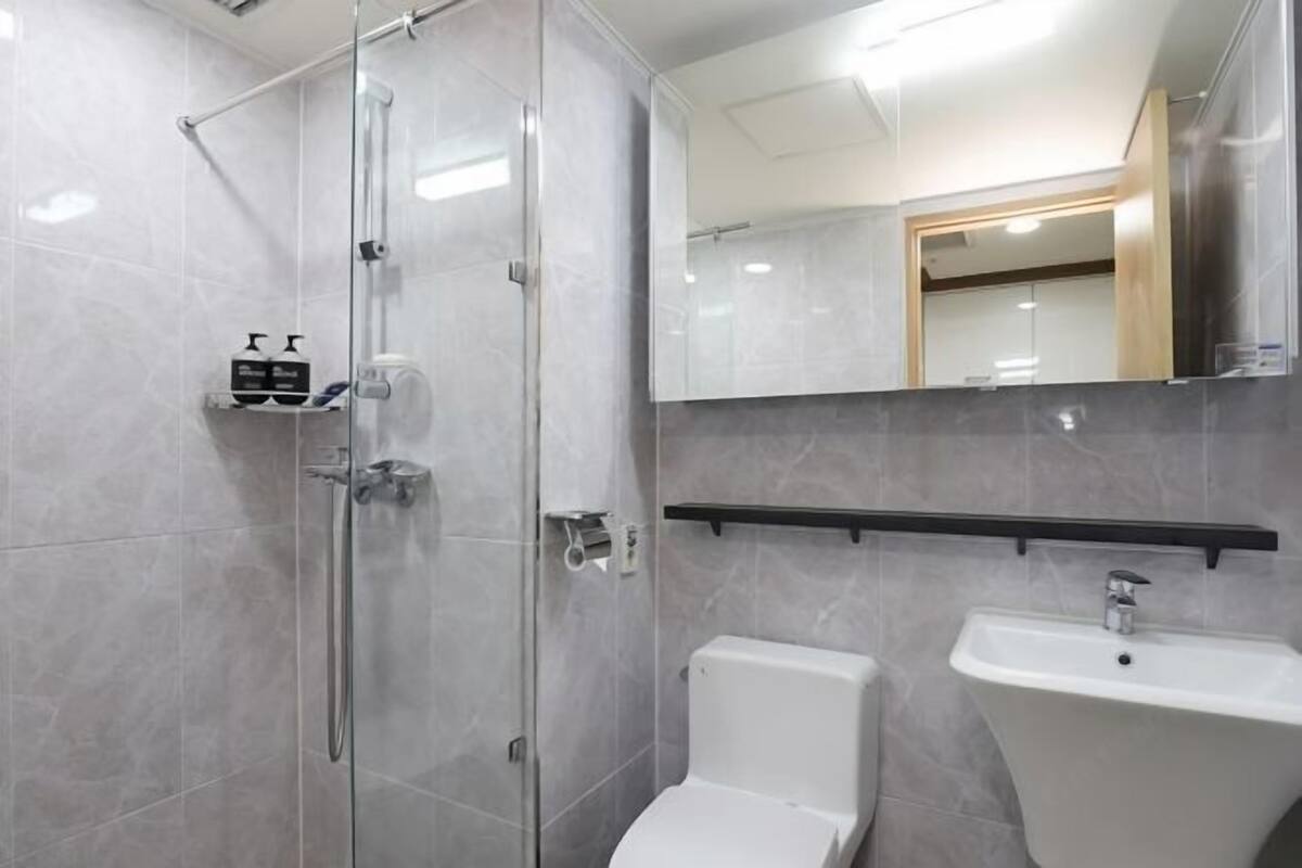 Bathroom | Shower, free toiletries, hair dryer, bathrobes