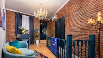 Comfort Double or Twin Room | Living area | 32-inch flat-screen TV with digital channels