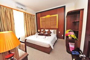 Minibar, desk, laptop workspace, iron/ironing board