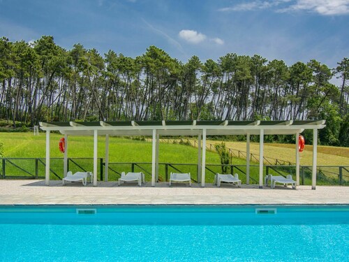 Confortable appartement avec climatisation, piscine, TV, patio, animaux admis et vue panoramique
