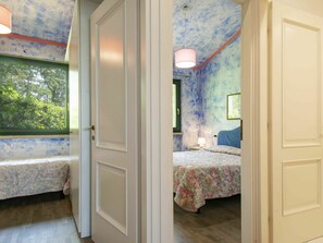 2 habitaciones y cuna de viaje 