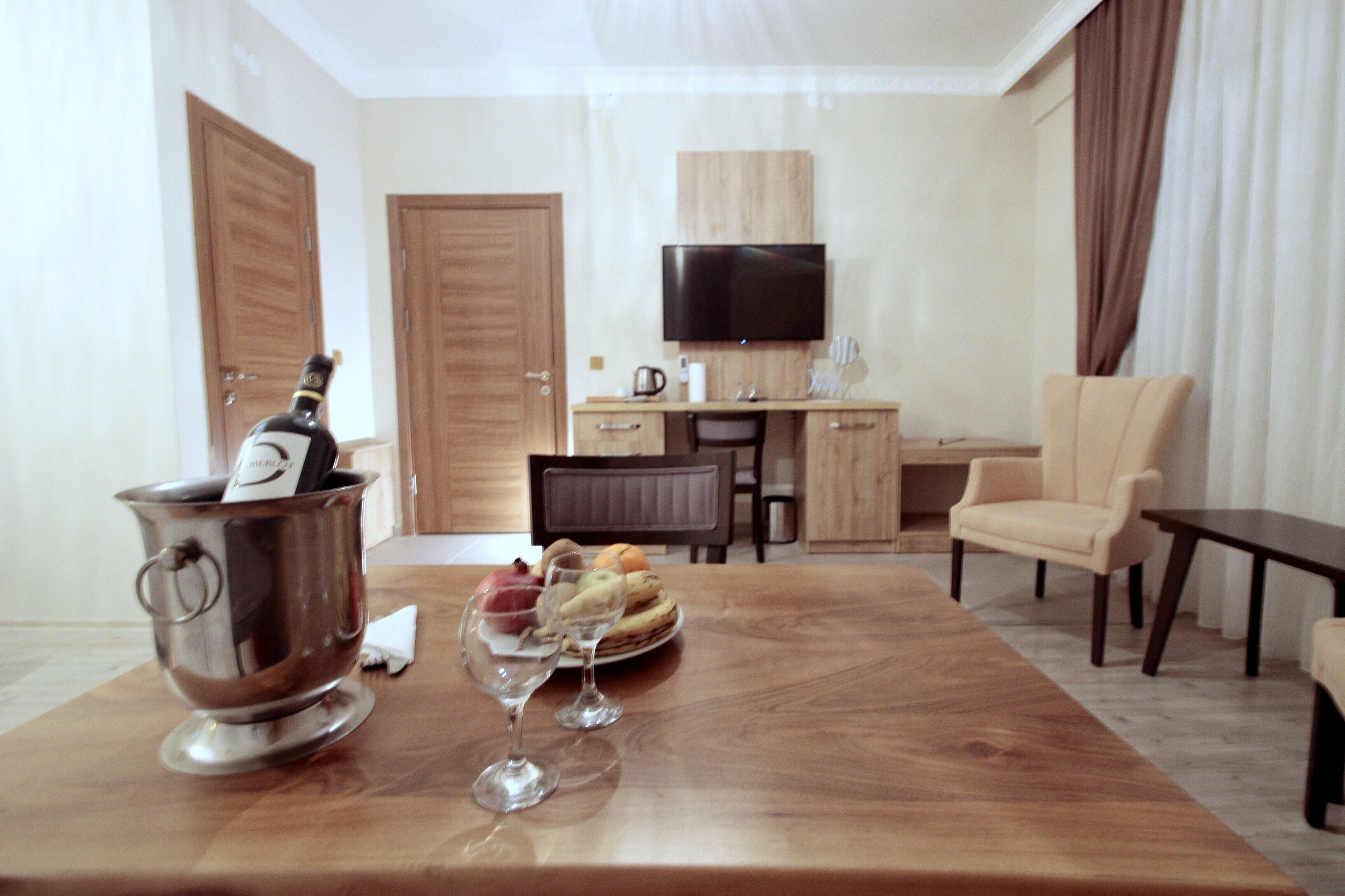 Panoramic Suite, Mountain View | Living room | 46-inch Smart TV with satellite channels, TV