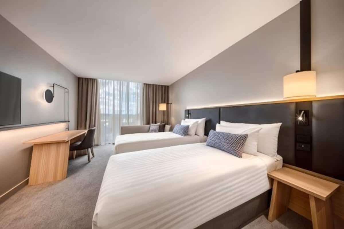 Hypo-allergenic bedding, minibar, in-room safe, desk