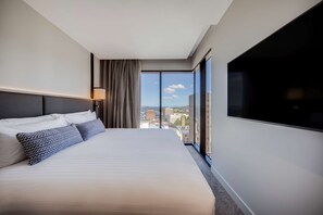 Hypoallergeen beddengoed, een minibar, een kluis op de kamer, een bureau
