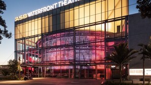 A modern building with a large glass facade and the text "ASB WATERFRONT THEATRE" at the top. - Travelodge Hotel Auckland Wynyard Quarter (Auckland)