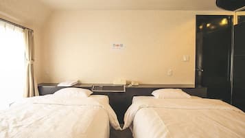 Twin Room | Iron/ironing board (on request), WiFi (free), bed sheets