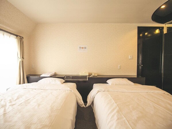 Twin Room | Iron/ironing board, free WiFi, bed sheets - Osaka Grand Hotel (Higashi-osaka)