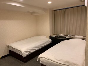 Twin Room | Iron/ironing board, free WiFi, bed sheets - Osaka Grand Hotel (Higashi-osaka)
