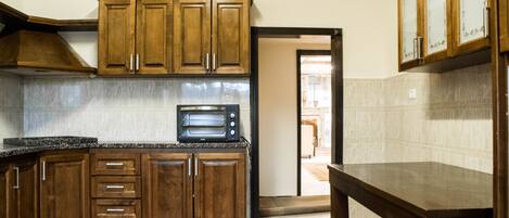 Grand Apartment | Private kitchen | Full-size fridge, stovetop, espresso maker, electric kettle