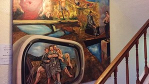 A mural with a ship, a figure on a rock, and a person on a staircase. - The Lodge Strand (Cape Town)