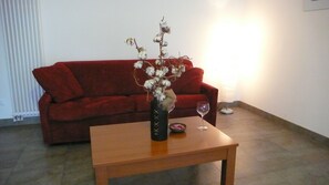 Apartment, 2 Bedrooms, Balcony, Mountain View | Living room | Flat-screen TV