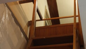 A wooden staircase with a handrail, leading to an upper floor. - Sea Levanto and Cinque Terre Calm, Cool, Freedom,for Children and pet Parking (Carrodano)