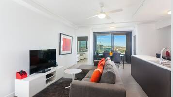 Executive Apartment | Living area | Flat-screen TV, DVD player
