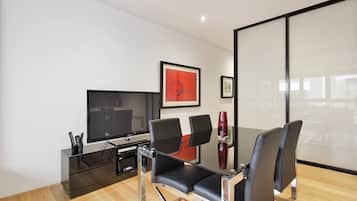 Executive Apartment | Living room | Flat-screen TV, DVD player