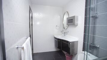 Designer toiletries, hair dryer, towels, soap