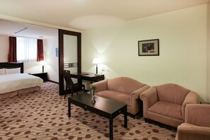 Deluxe Quadruple Room, 2 Queen Beds, Bathtub | Living area | LED TV - Herkang Hotel (Taichung)
