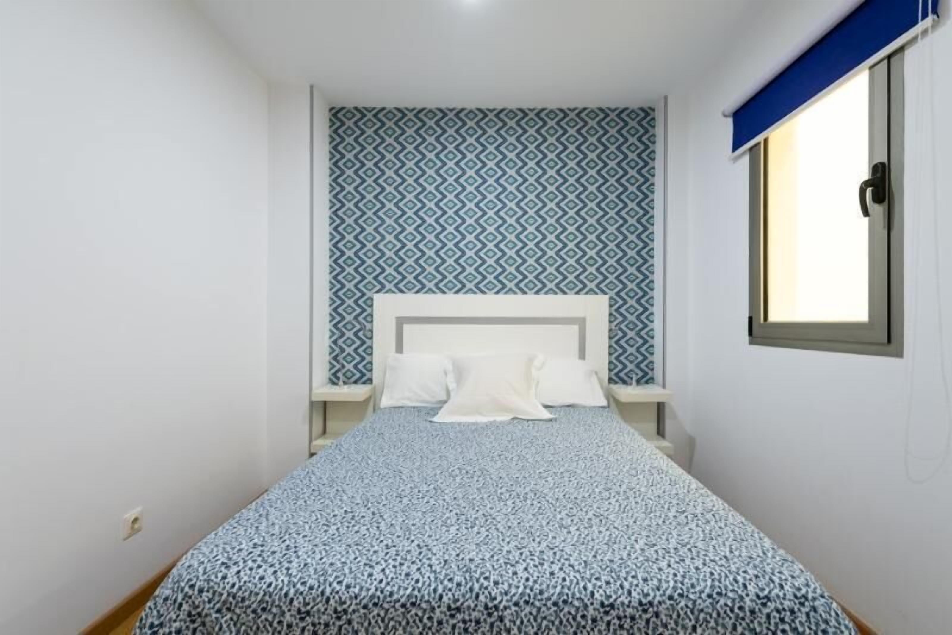 Apartamento familiar | Ropa de cama de alta calidad y espacio para trabajar con un portátil