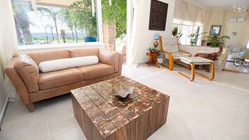 Villa, 4 Bedrooms | Living area | Flat-screen TV, fireplace, computer