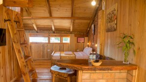 Deluxe Double Room | Living area - Nile Front Cottages (Jinja)