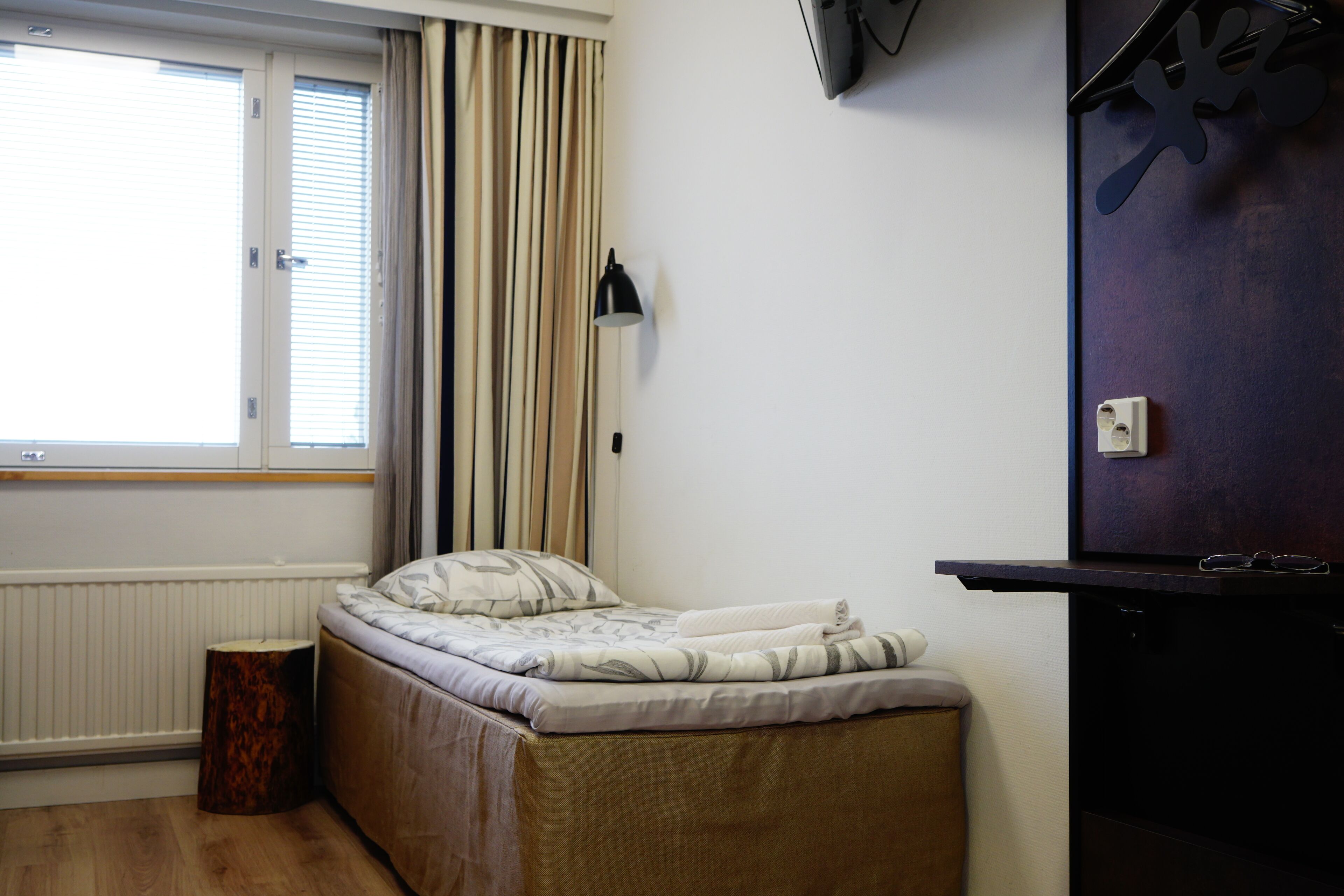 compact twin room, courtyard view | blackout curtains, iron/ironing board, free wifi, bed sheets