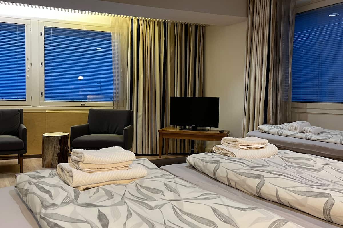 family room, sea view | blackout curtains, iron/ironing board, free wifi, bed sheets
