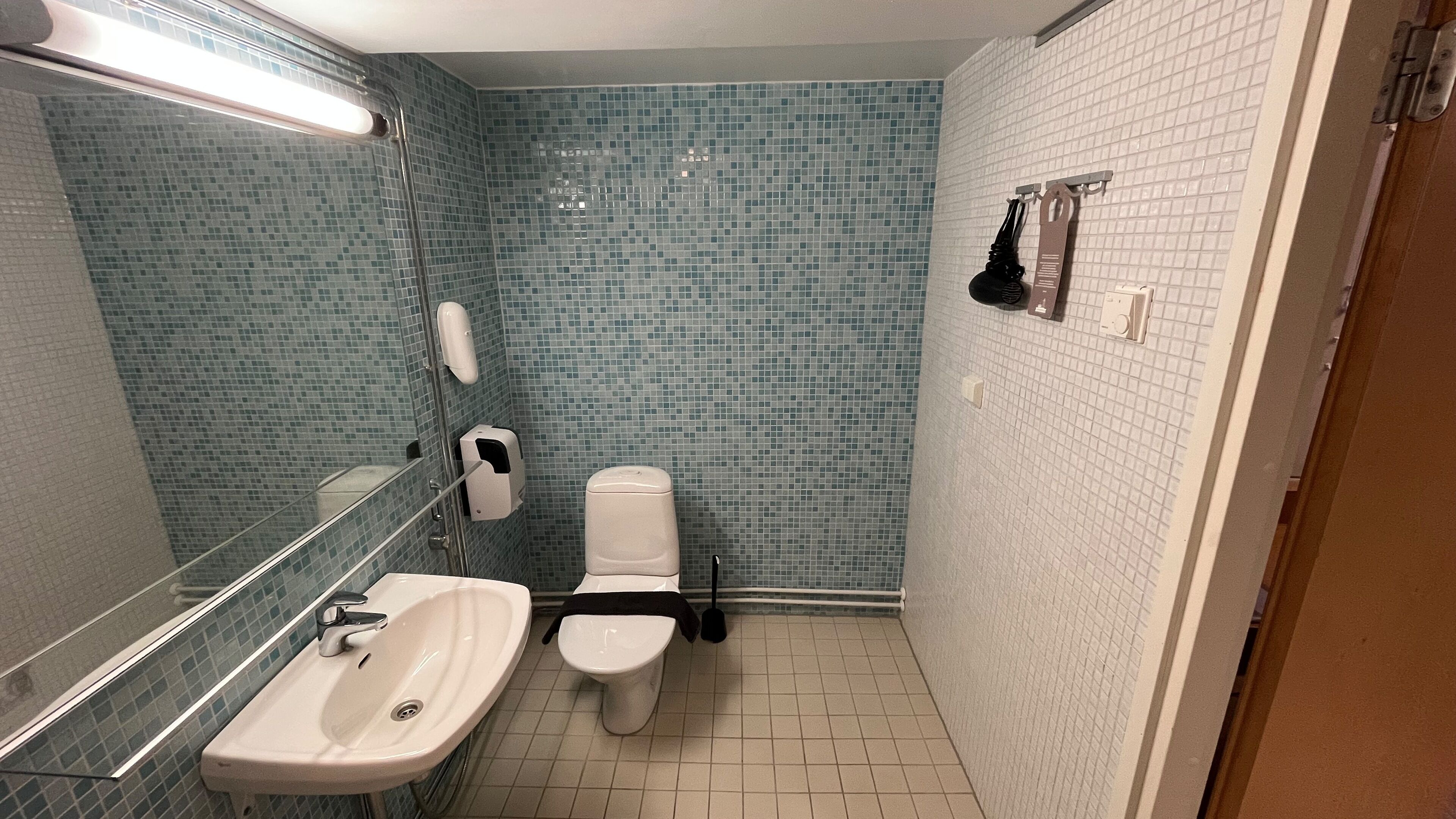 family room, sea view | bathroom | shower, hair dryer, towels, soap