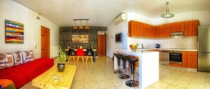Apartment, 2 Bedrooms | Private kitchen | Full-size fridge, oven, stovetop, coffee/tea maker