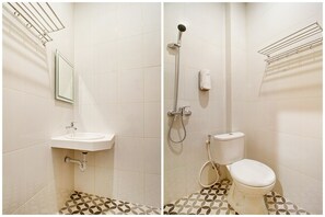 A bathroom with a sink, toilet, and shower. - OYO 2354 3 Point Residence (Surabaya)