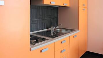 Apartment, 1 Bedroom, Balcony, Garden View | Private kitchen | Coffee/tea maker, highchair