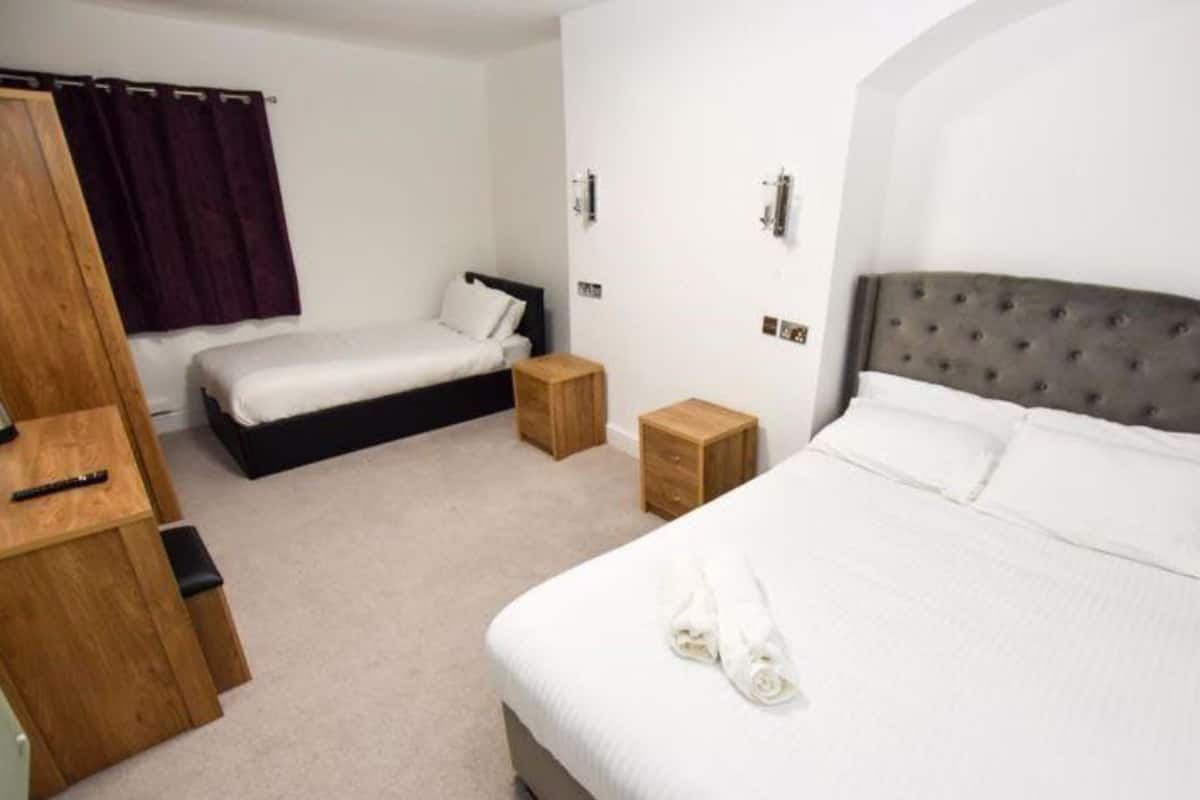 Premium bedding, memory-foam beds, iron/ironing board, free WiFi