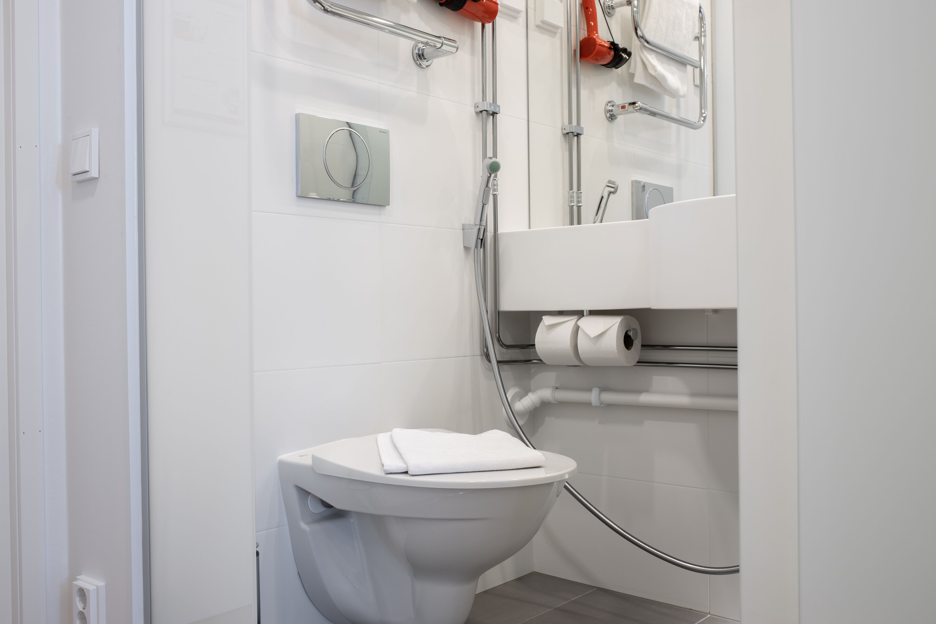 standard single room | bathroom | shower, rainfall showerhead, hair dryer, heated floors