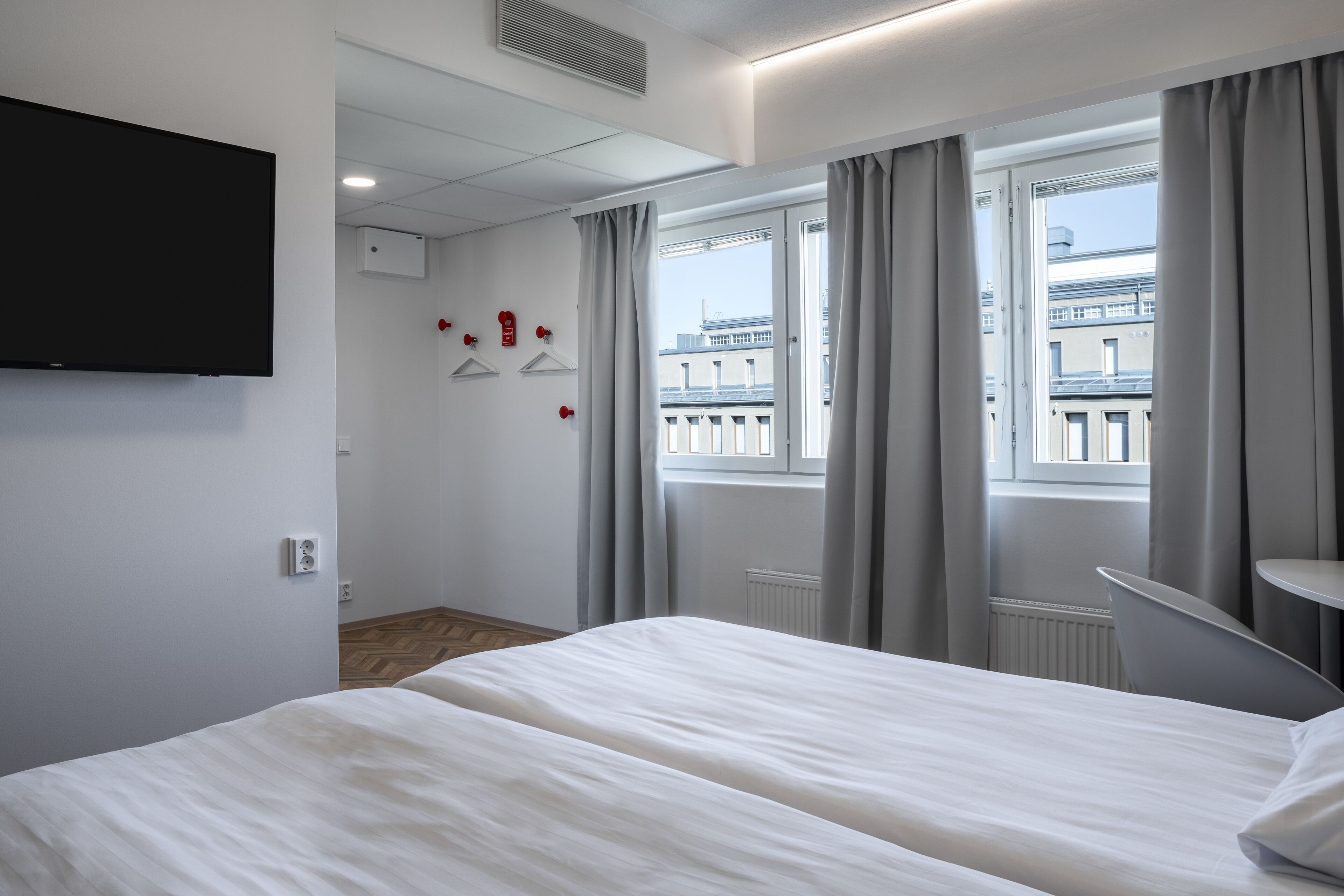 1 bedroom, laptop workspace, blackout curtains, soundproofing