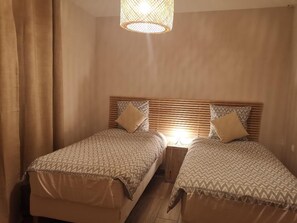 2 bedrooms, desk, iron/ironing board, travel cot