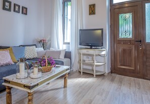 Apartament, 1 dormitori | Sala d'estar | Televisor de pantalla plana