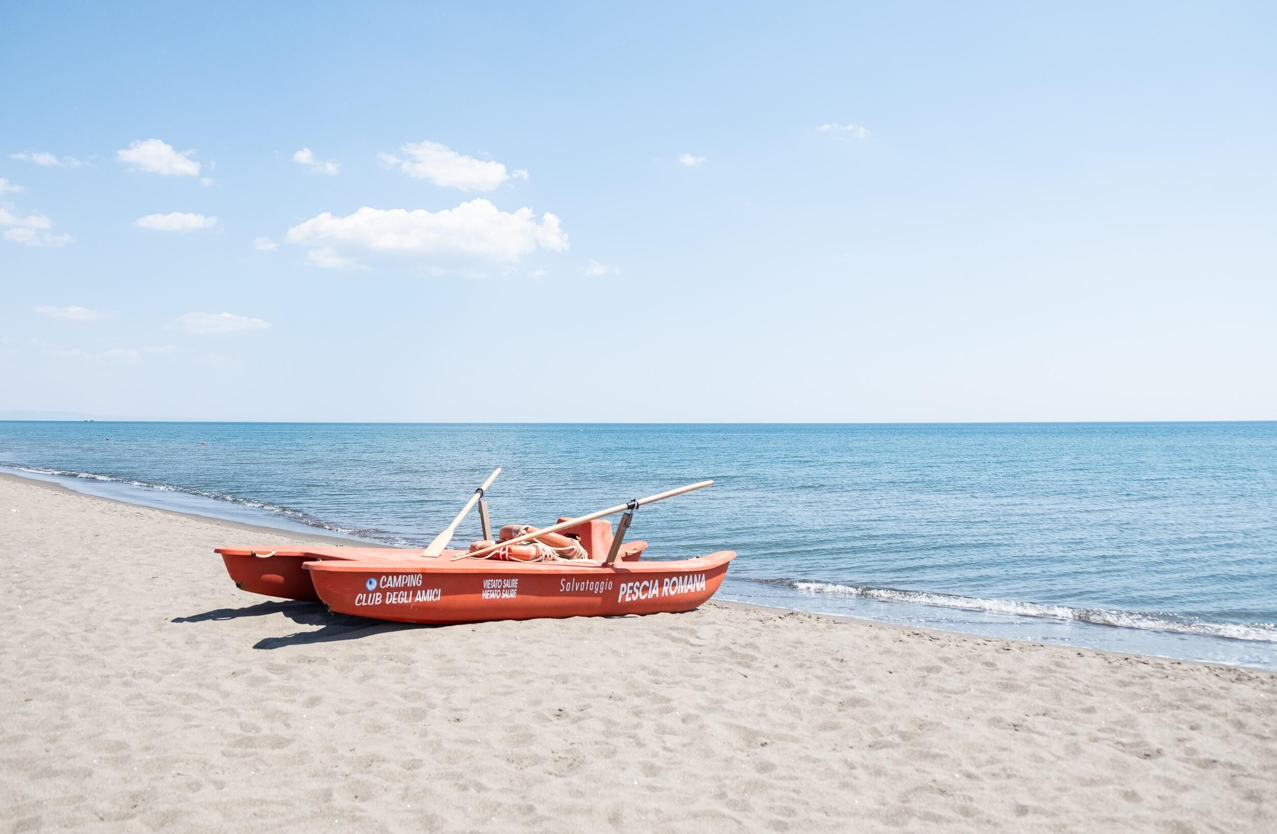 Private beach, black sand, sun-loungers, beach umbrellas