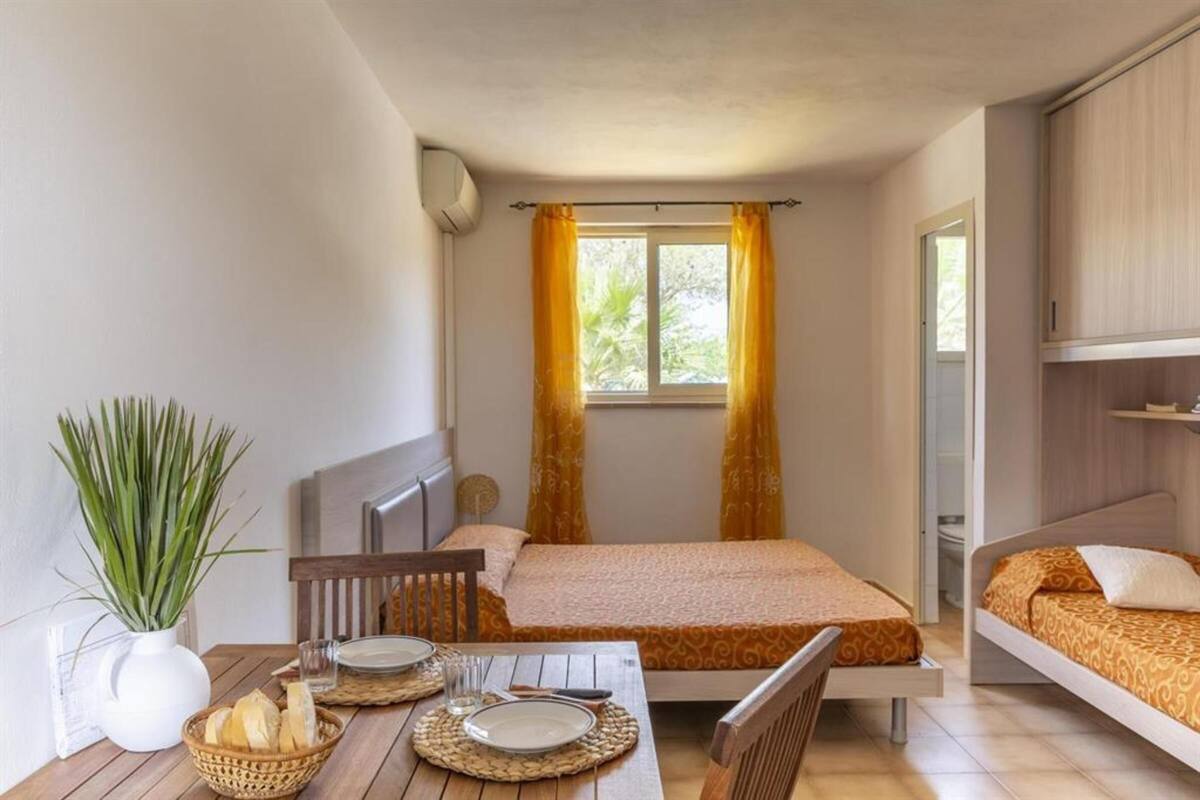 Basic Studio, 1 Bedroom, Patio | Living area | Ping pong